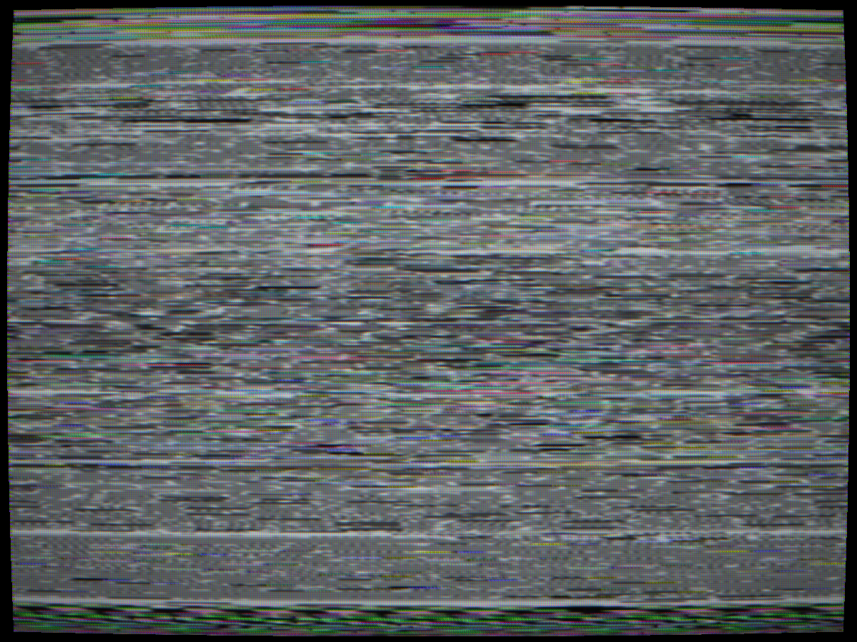 Videocrypt (Sky BSkyB / Eurocrypt, 1989-1996) — PAL composite with each active scan line circularly rotated by a different pseudo-random cut point. Sync pulses and colour burst are completely intact; the receiver locks normally. The 575 active lines each carry their full-bandwidth luma and chroma content but shifted sideways by a different amount, distributing the test card's structured content into horizontal stripes at random phase offsets. The seam at each rotation boundary produces a brief noise burst of 6-8 samples.